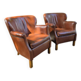 Chaises longues en cuir, design danois. Style urbain moderne.