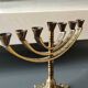 Jerusalem Menorah. Modernist style. In antique gold patinated brass. Dimensions: 15 x 20