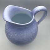 Blue glazed terracotta pitcher with hand-painted decoration, signed