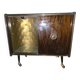 Vintage 50s-60s bar cabinet with tufted upholstery and lighting.