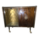 Vintage 50s-60s bar cabinet with tufted upholstery and lighting.