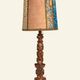 Renaissance table lamp in polychrome carved wood with cherubs.