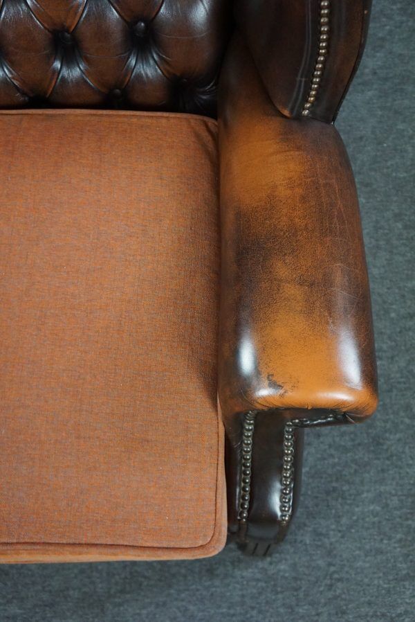 Chesterfield armchair with armrests