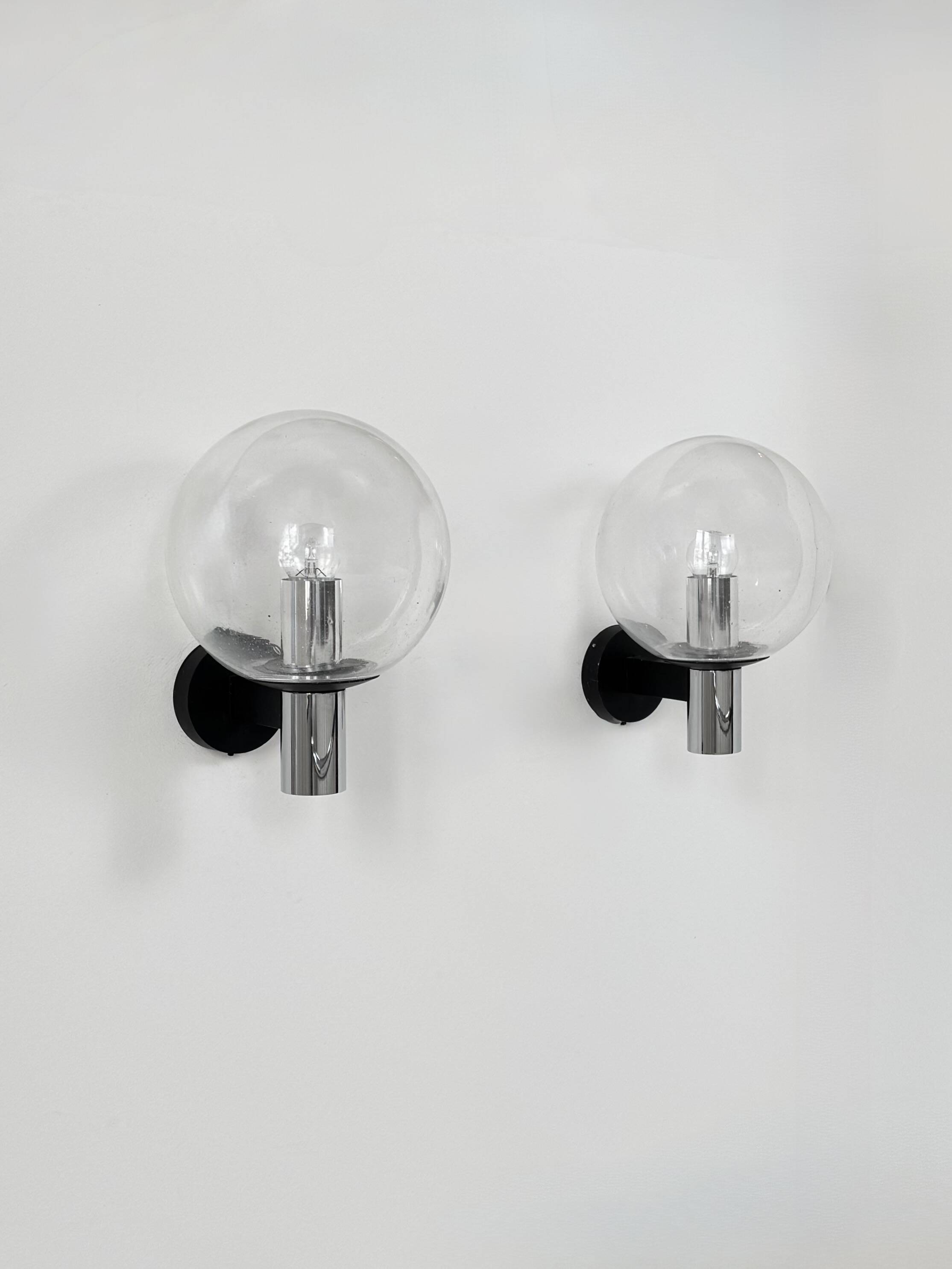 Pair of vintage XL wall lights, chrome metal and bubble glass, France, 1970.