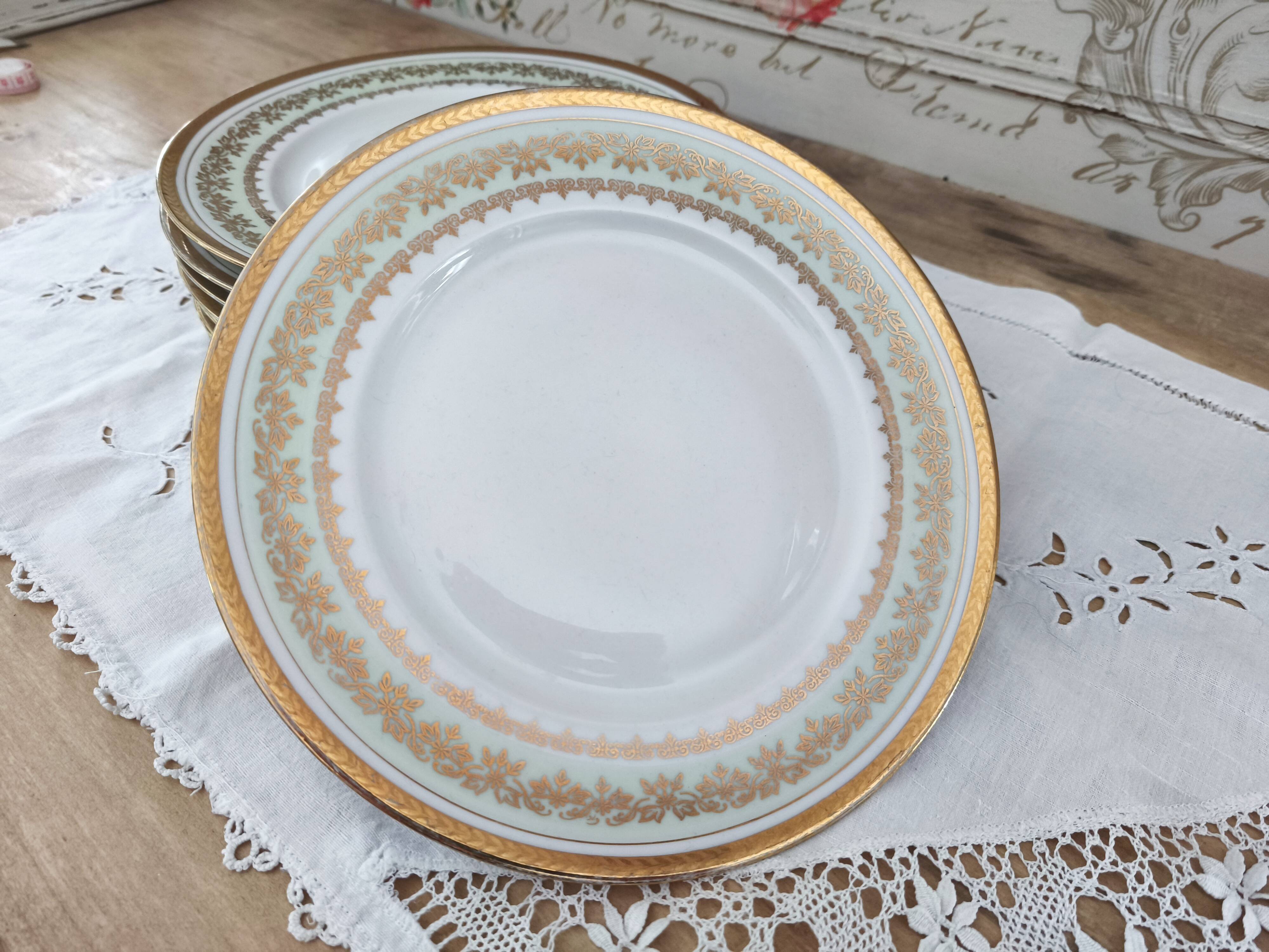 Set of 8 PL France porcelain dinner plates, water green marli and frieze