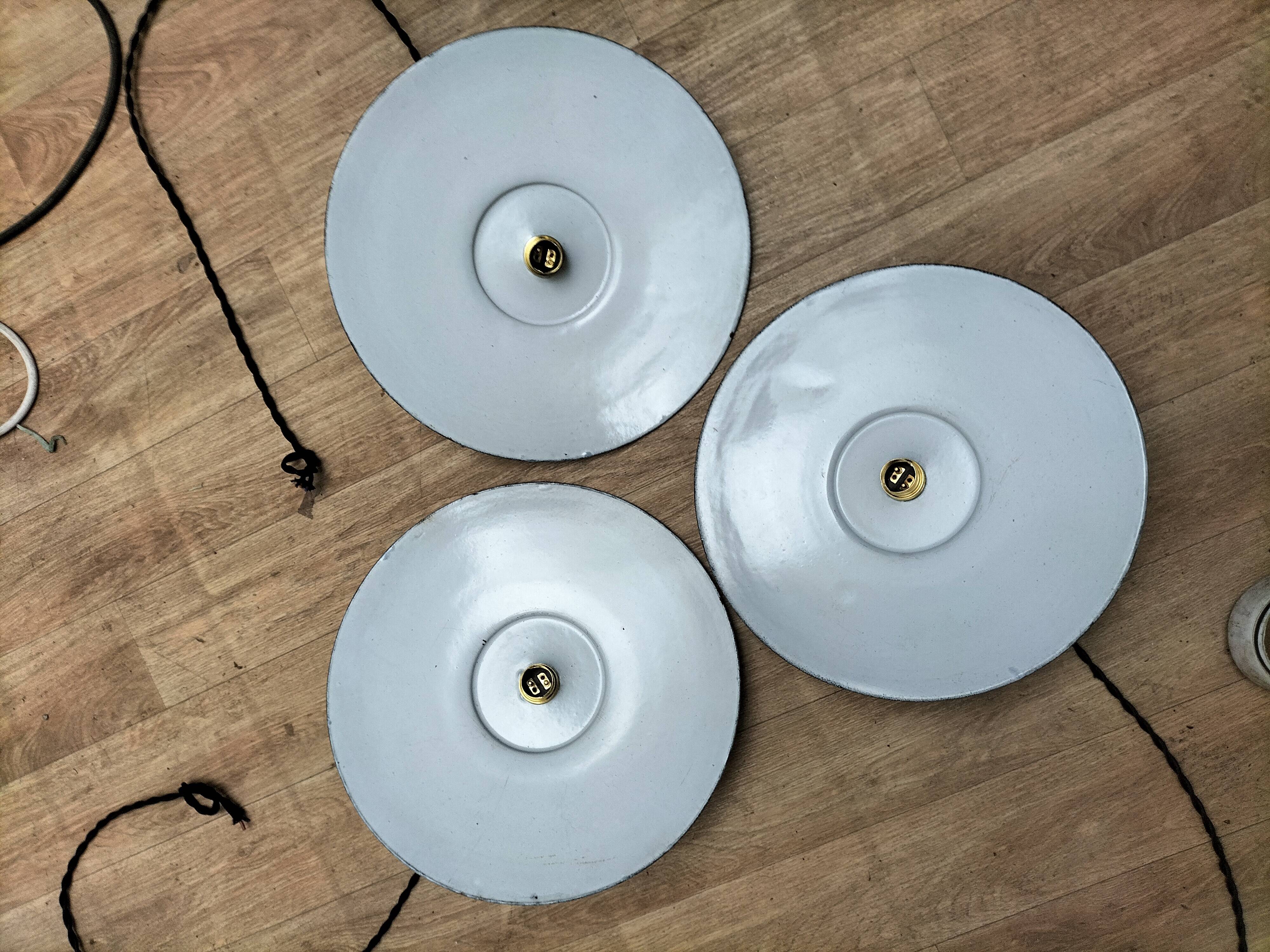 3 blue enameled sheet metal pendant lights