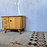 Vintage bedside table with compass feet