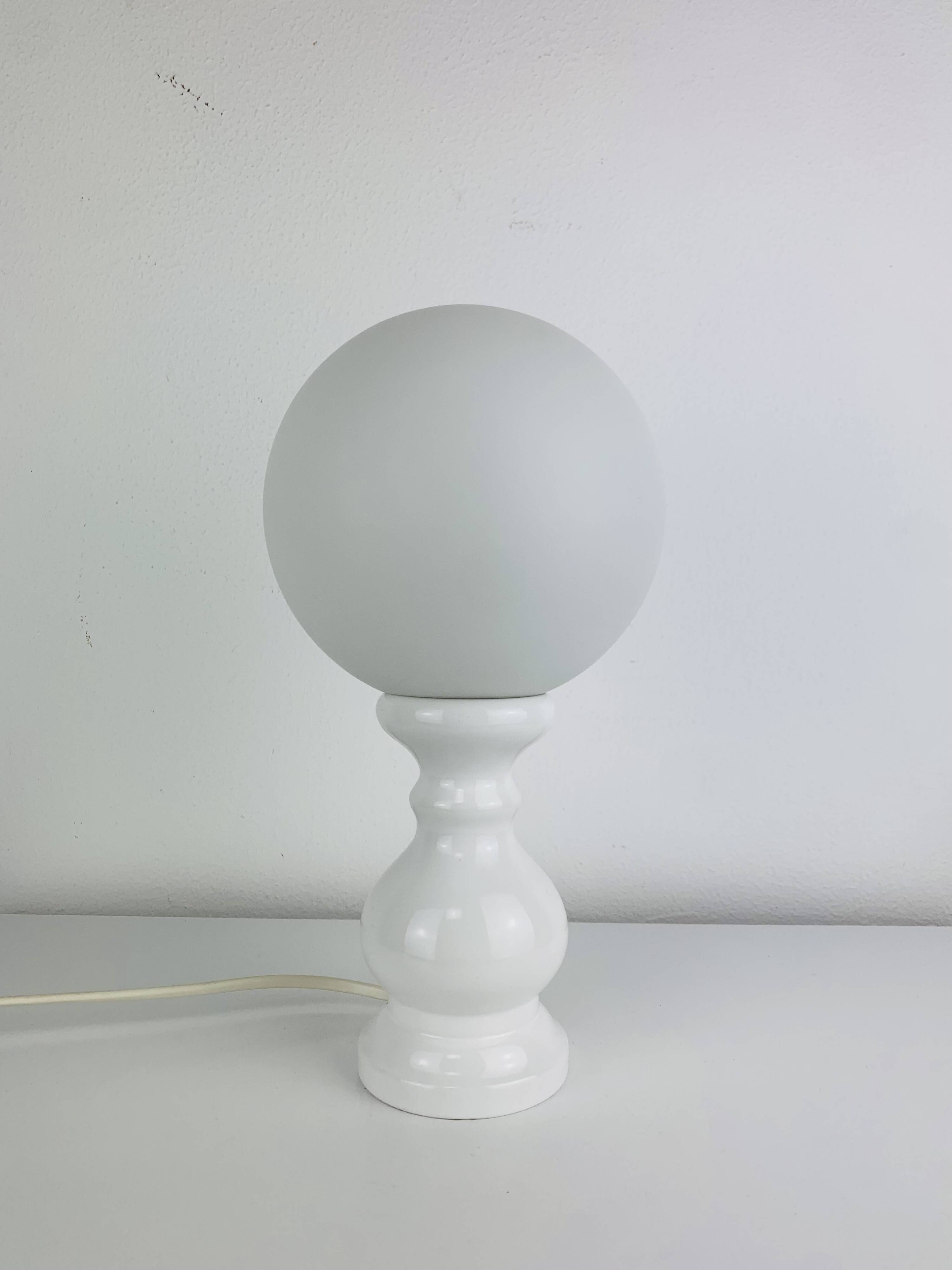 Turned wood lamp with opaline glass globe, 1970s
