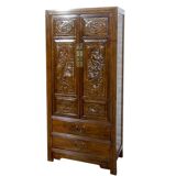 Vietnamese wardrobe with handcrafted carved doors.