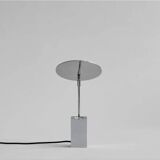 Reflect table lamp in chrome metal, contemporary work.