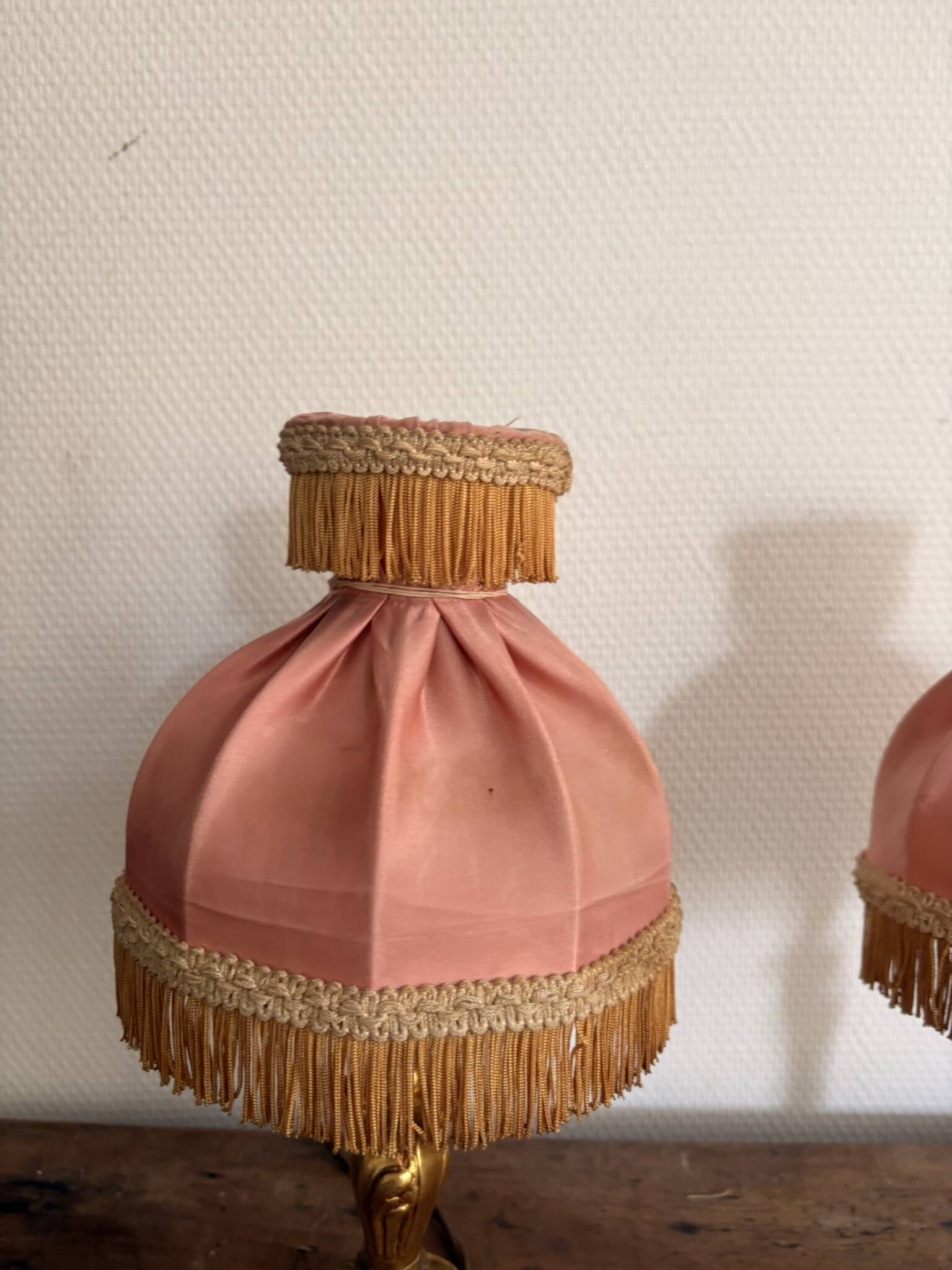 Pair of Bedside Lamps in Gilded Bronze with Pink Silk Shades and Fringes in Louis XV Style