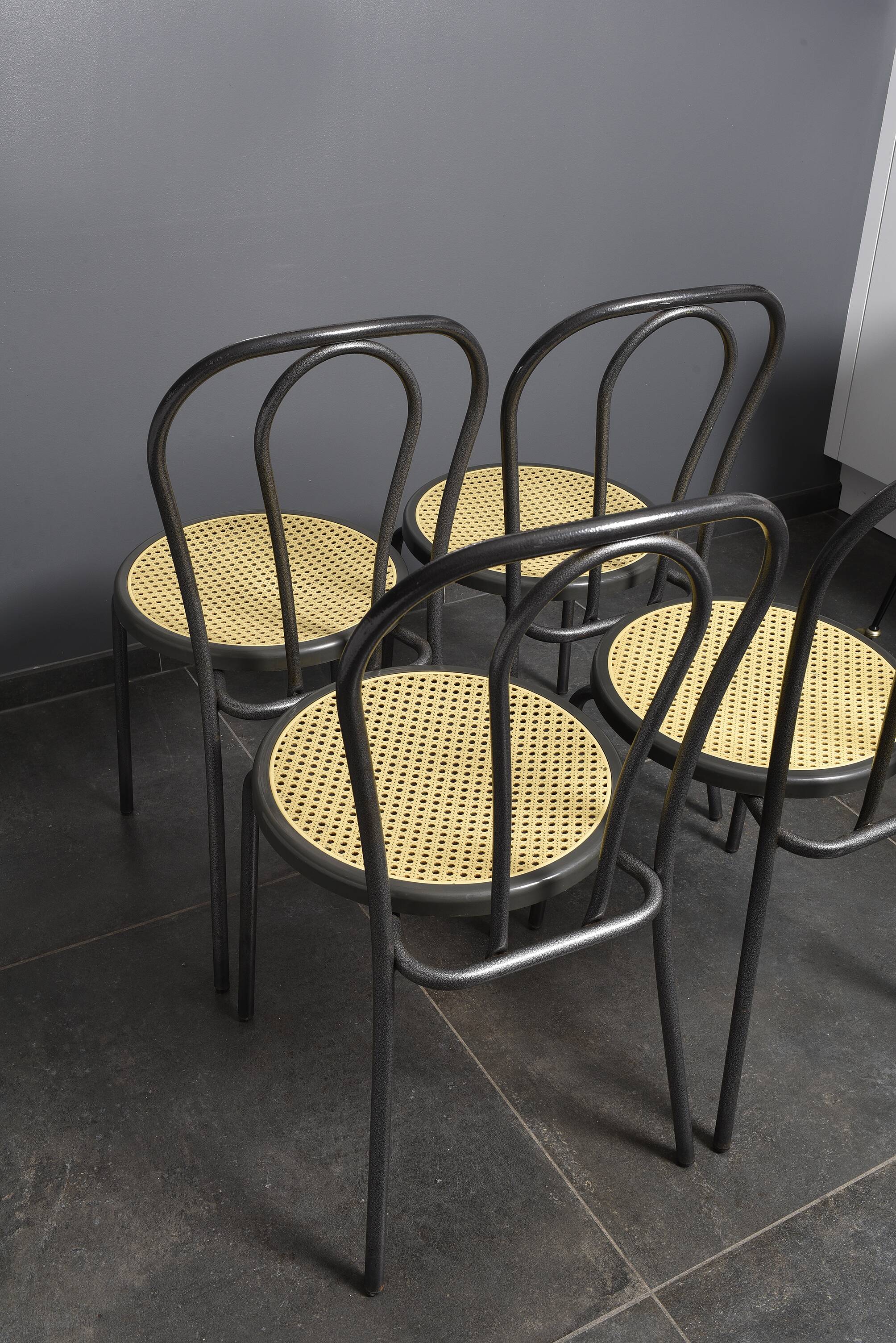 Bistro chairs, imitation cane seat.