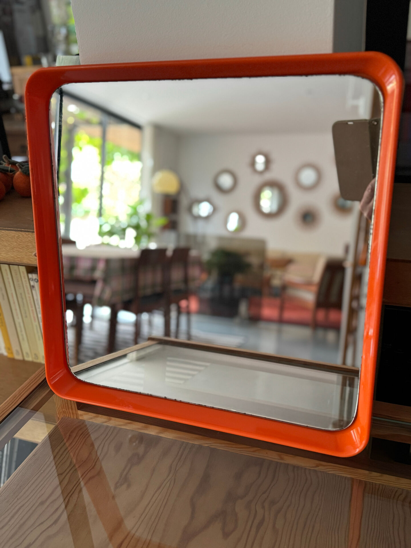 Orange moulded plastic mirror
