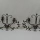 pair of grey patinated iron wall sconces