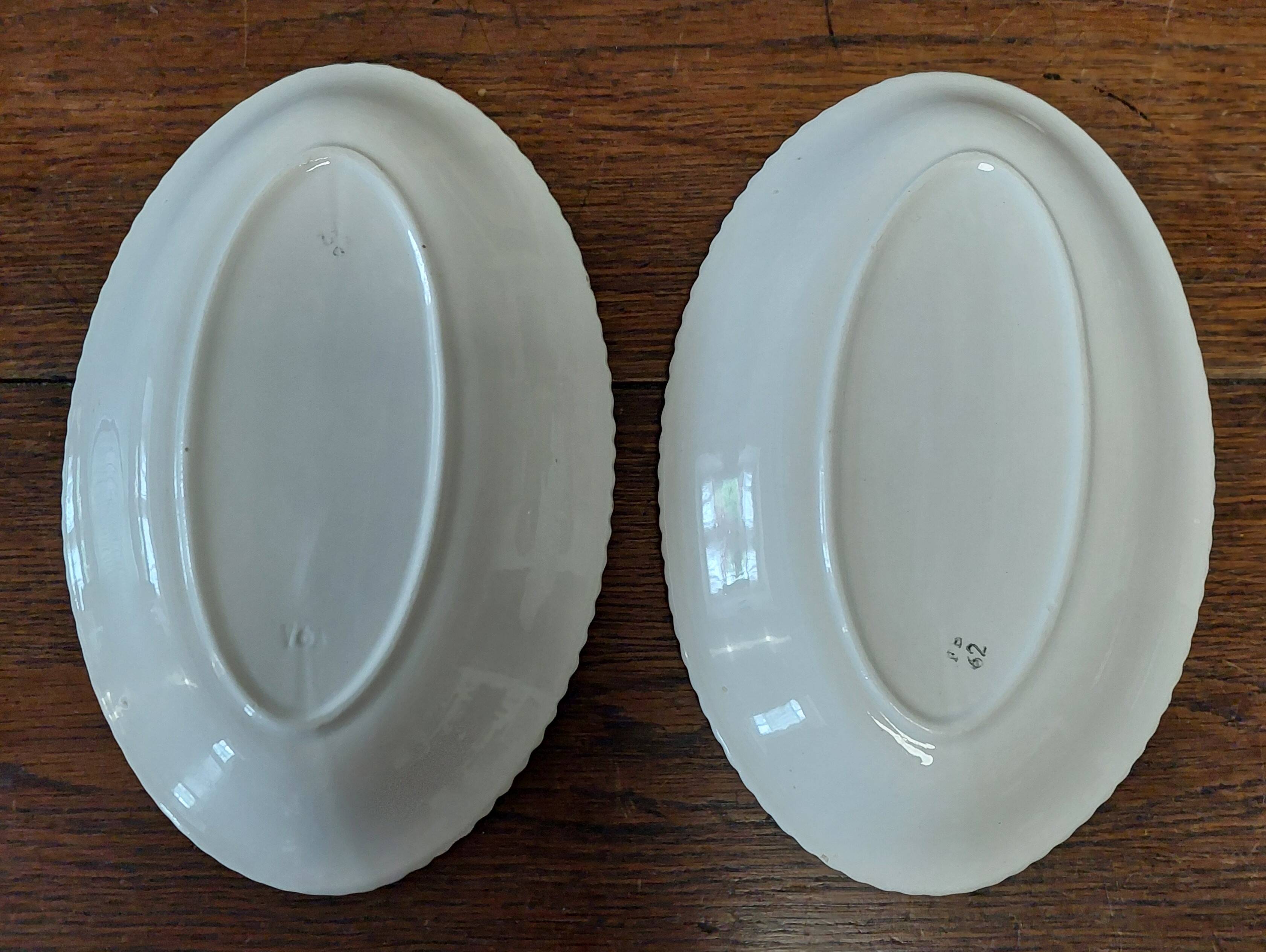 Pair of Badonviller iron earthenware dishes, Amina model