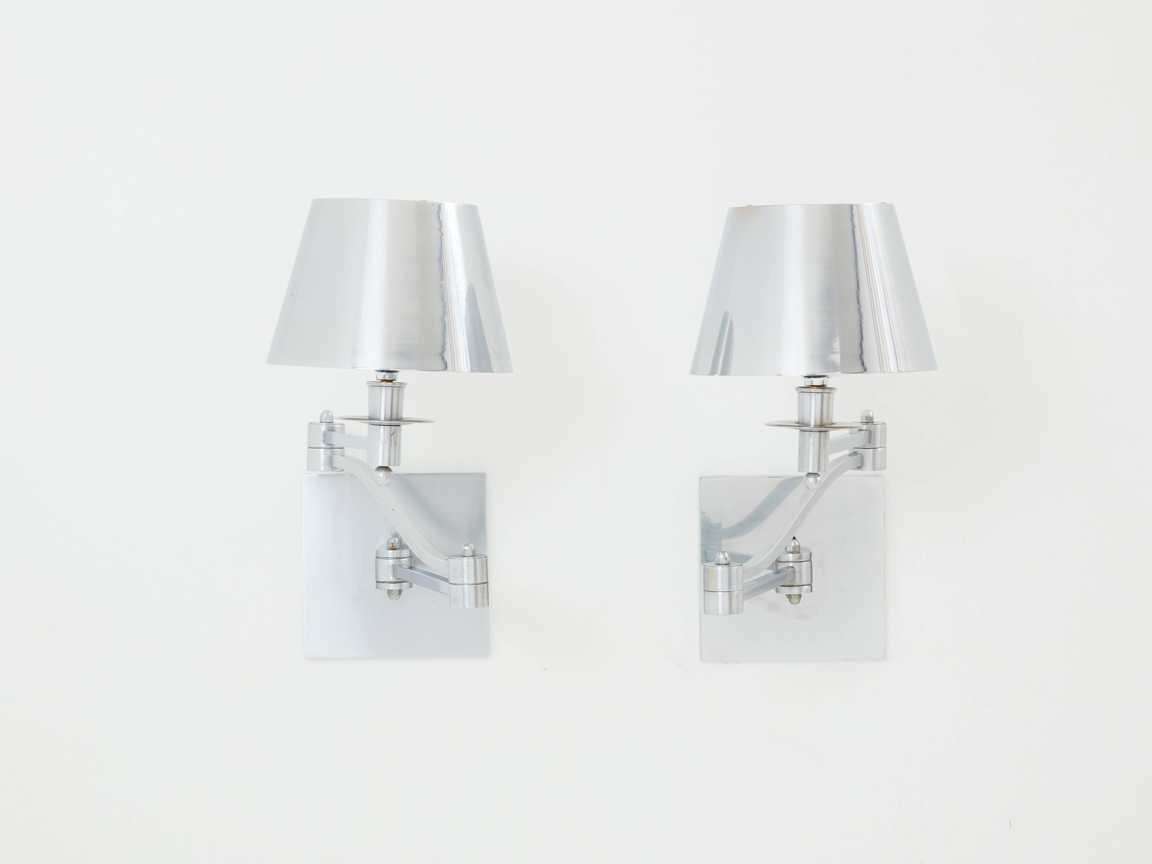 Pair of Maison Charles adjustable brushed steel wall lights circa 1960