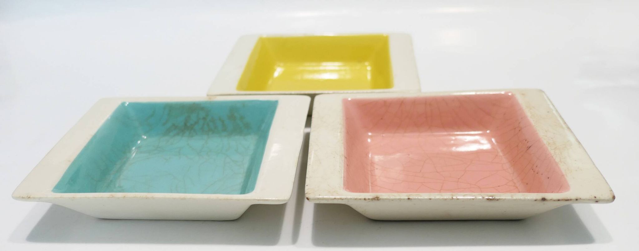 Set of three German ceramic catchalls from the 1950s.