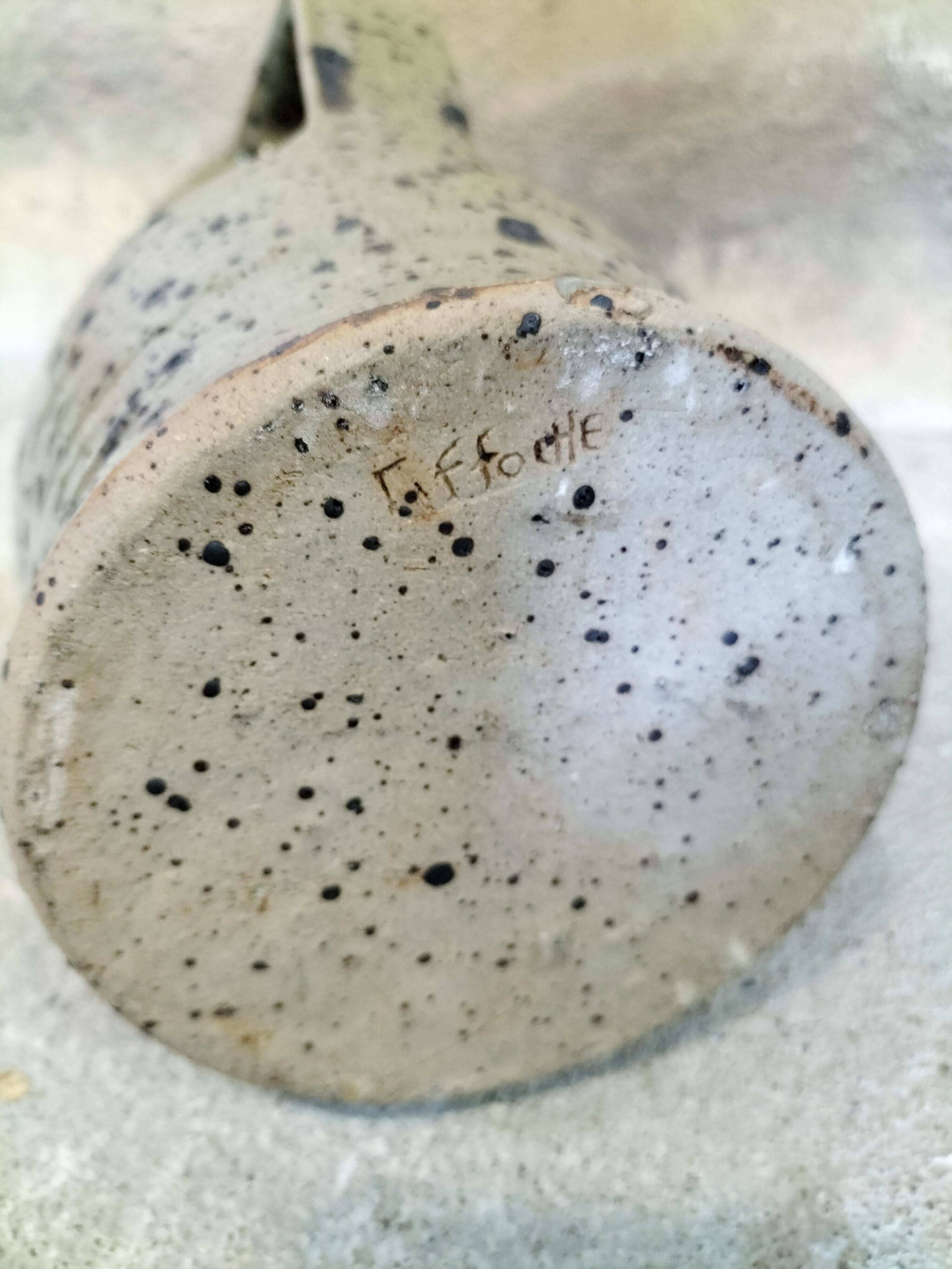 Stoneware pitcher by Gustave Tiffoche