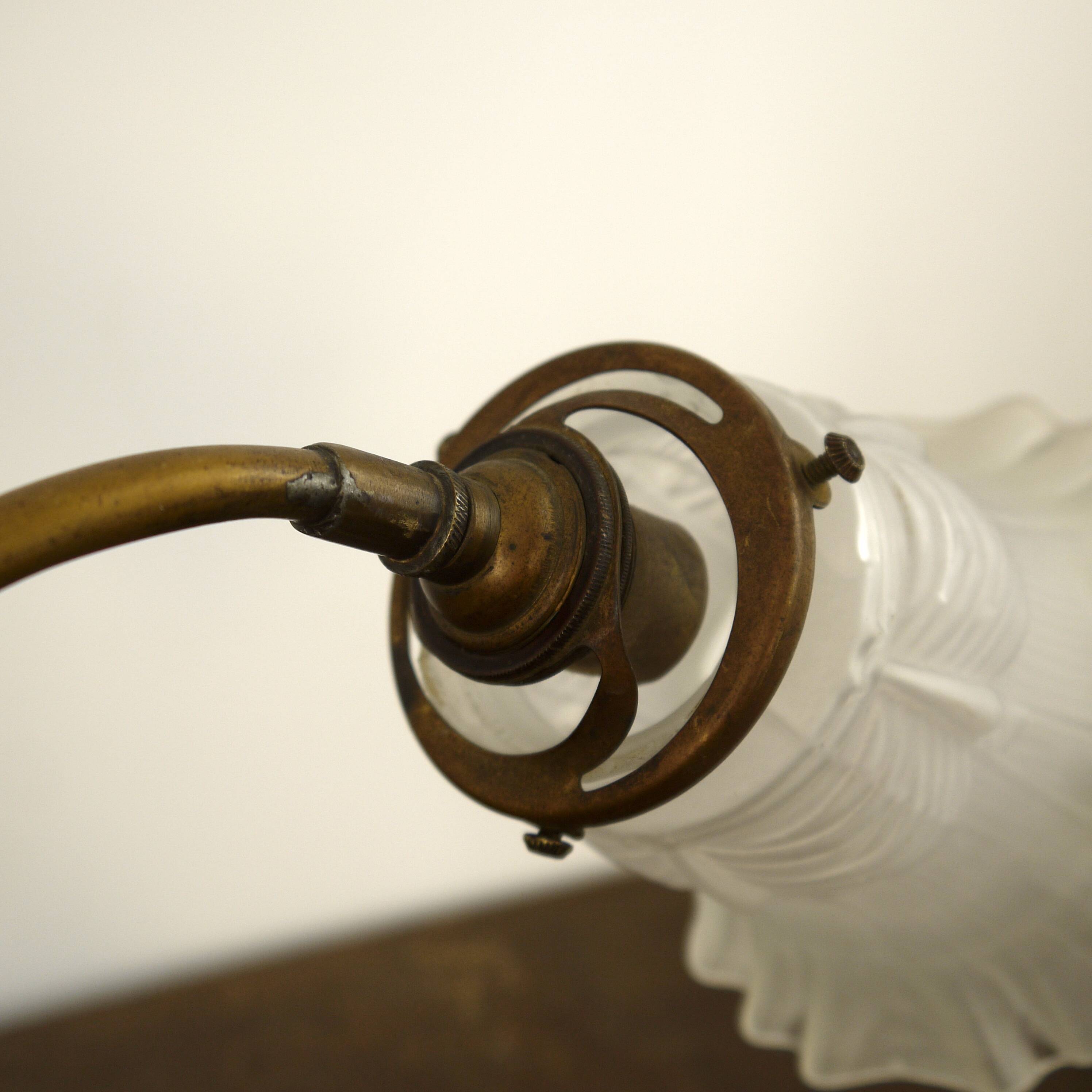 Brass lamp with glass globe