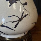 Porcelain lamp in the Indochinese style enhanced with gilding