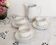 Set of 3 white and gold bistro coffee cups and coffee pot, in porcelain