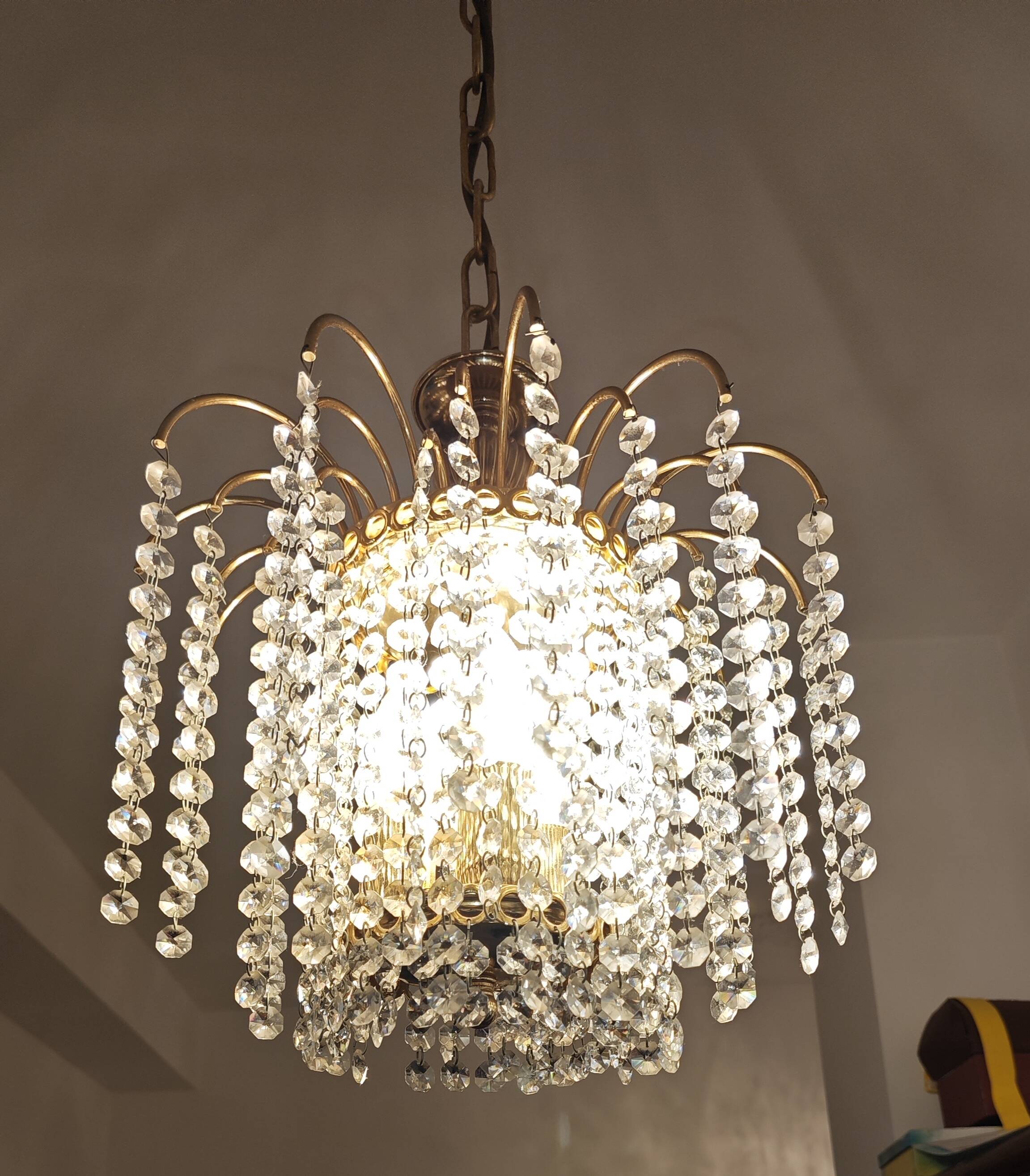 Brass cascading chandelier with crystals