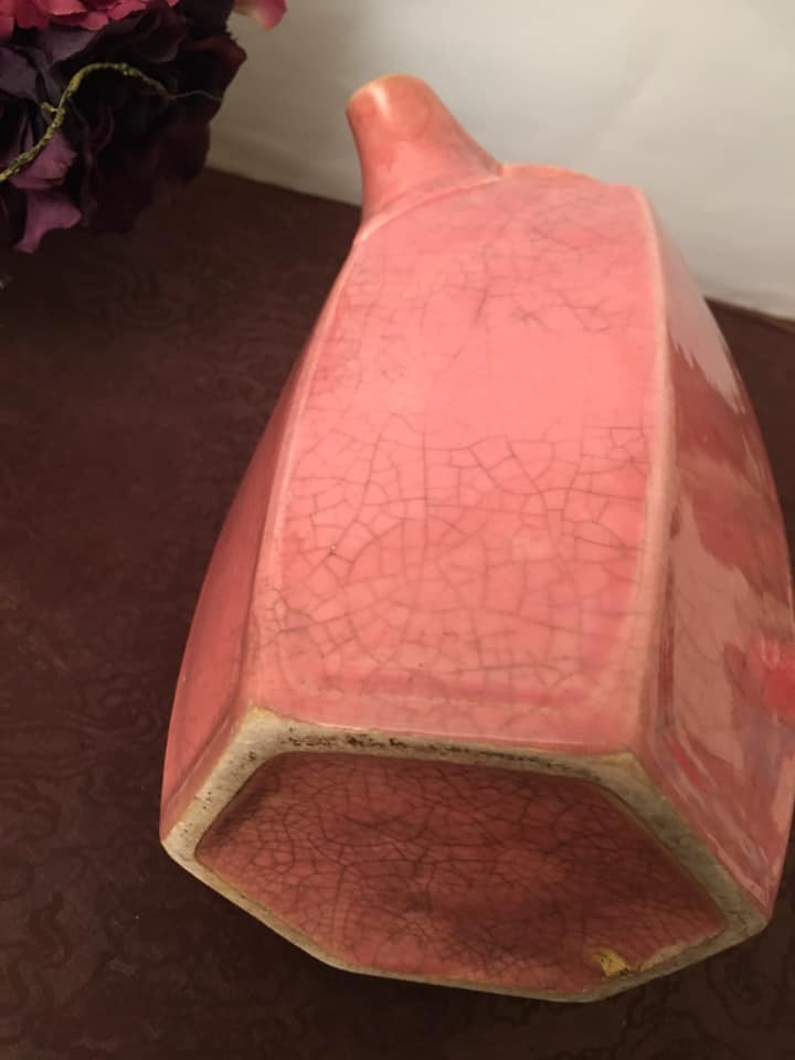 Old pitcher in earthenware of a very pretty pink