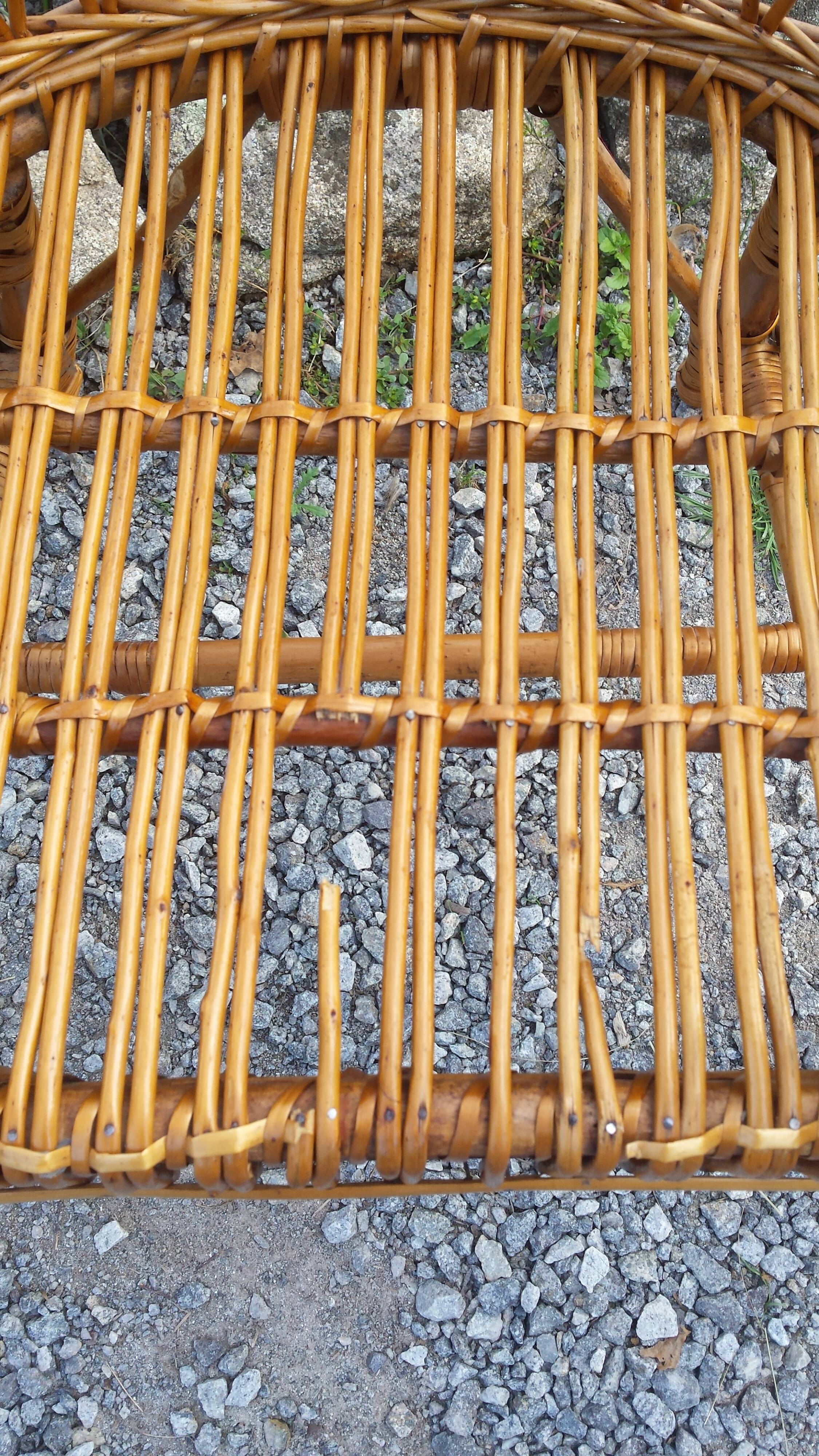 Wicker or rattan armchairs