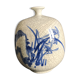 Vase boule à col pincé aplati