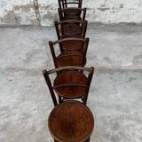 Série de 7 anciennes chaises bistrot Baumann bois courbé assise ronde