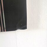 Vintage kinetic table on stainless steel plate