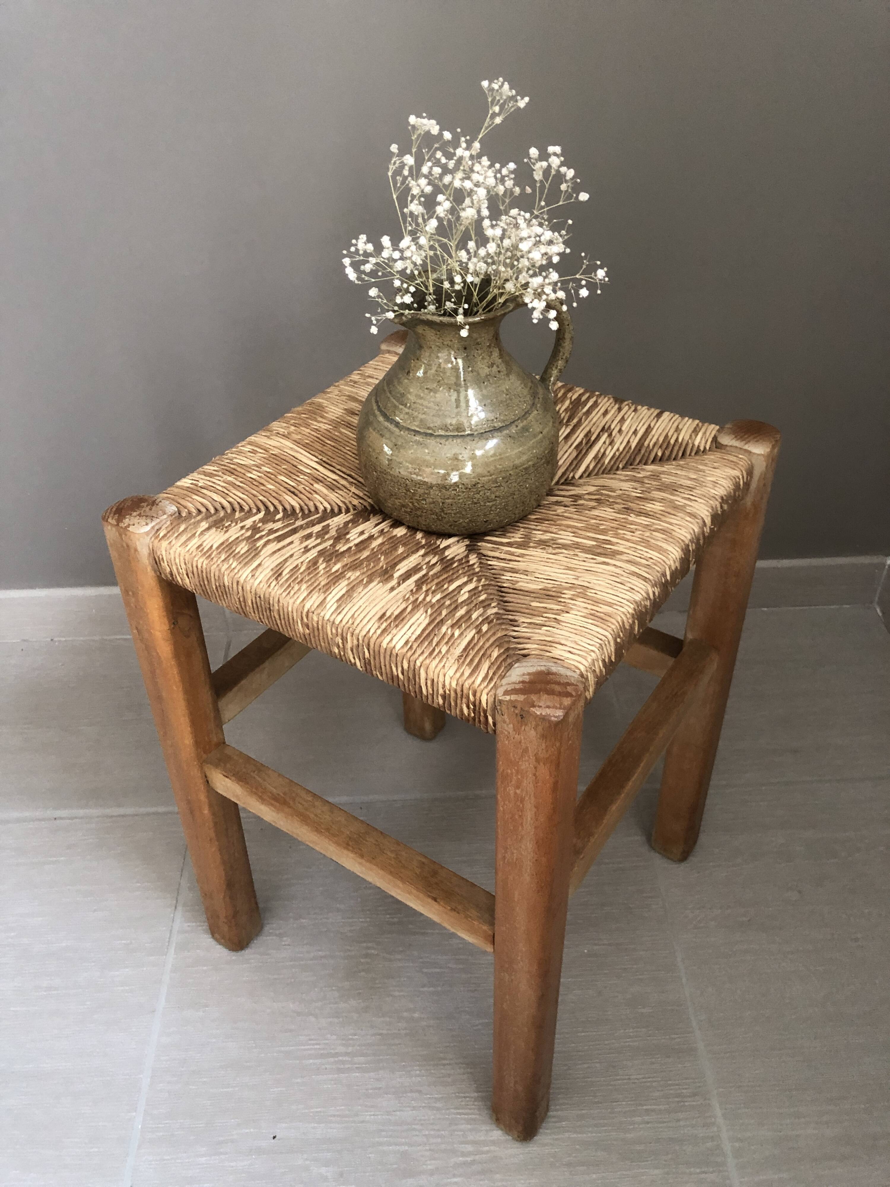 Wooden stool with straw seat