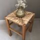 Wooden stool with straw seat