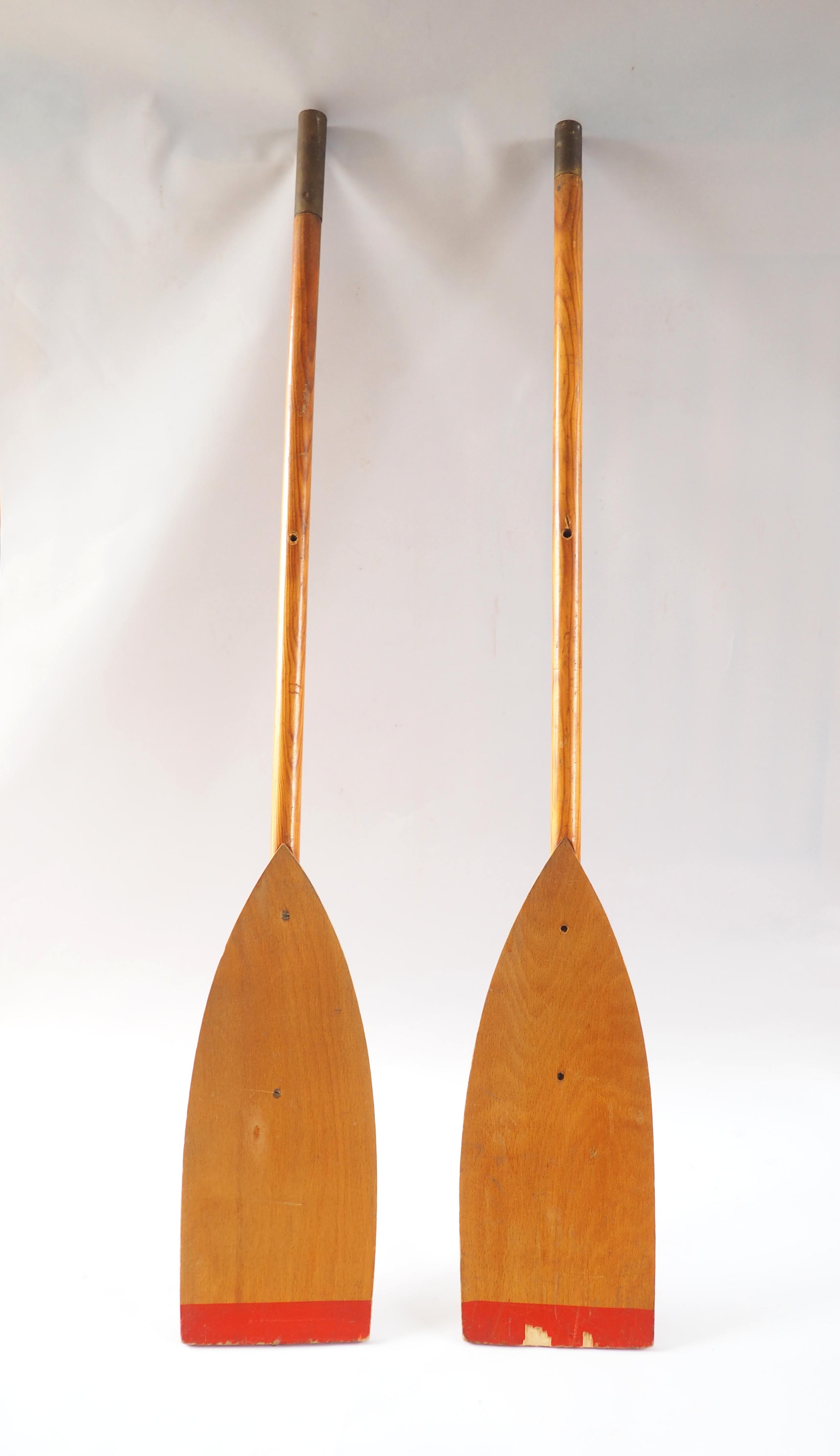 Pair of old wooden oars