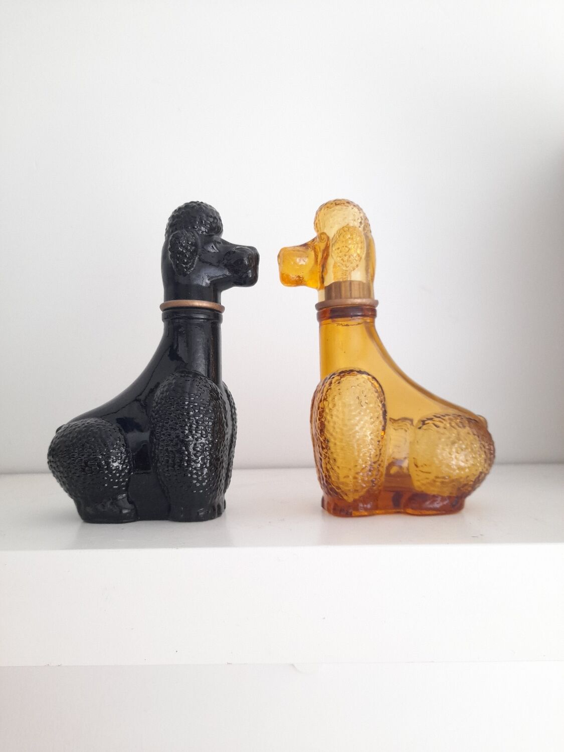 Set of two Empoli poodle glass bottles