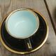 Set of 9 cups and sub-cups in black ceramic and colored gold border
