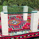 Table basse vintage en travertin et verre