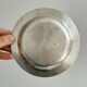 Round patinated silver-plated metal dish