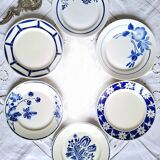 Mismatched antique flat plates in earthenware