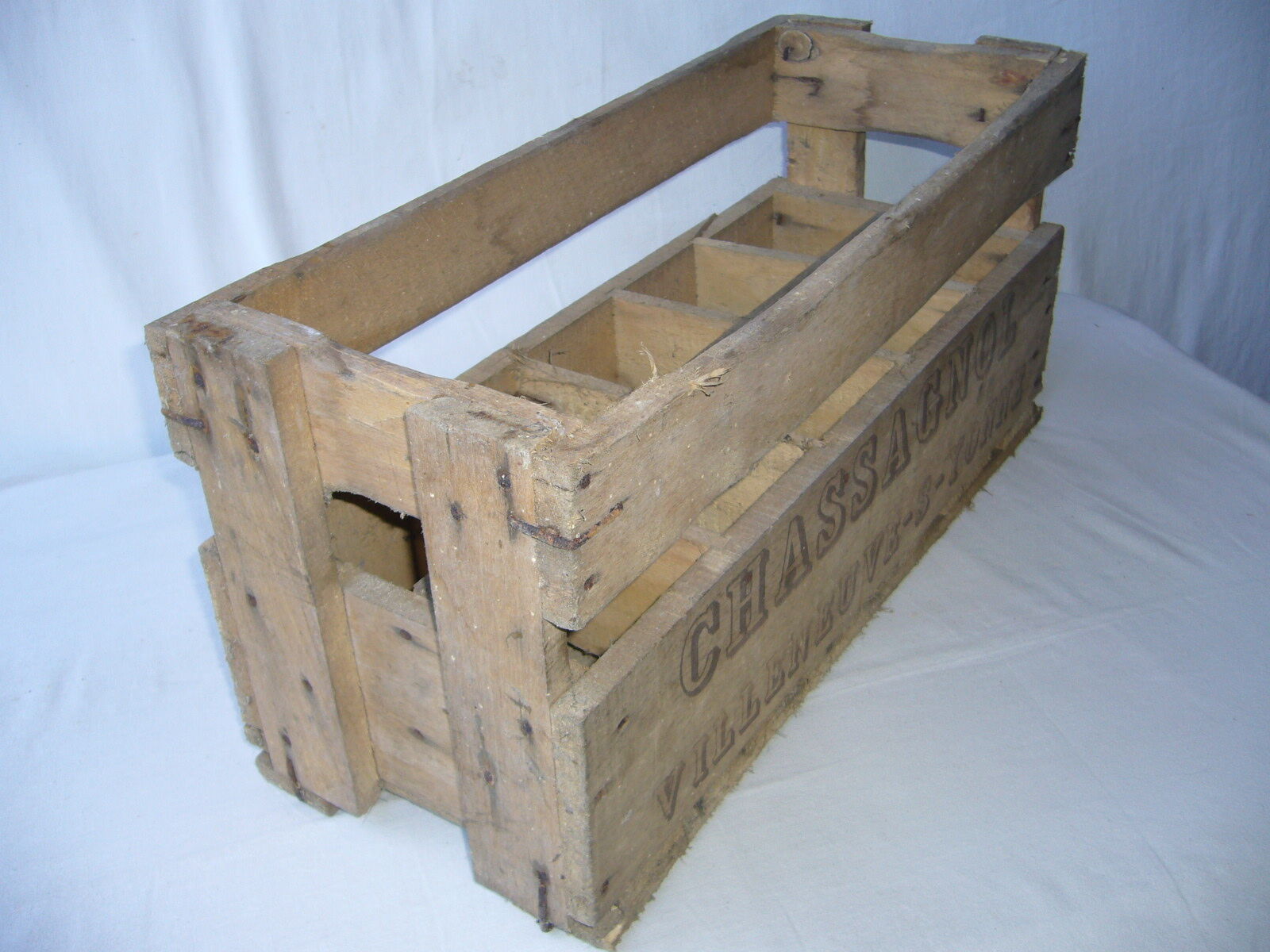 Old wooden crate for milk bottles