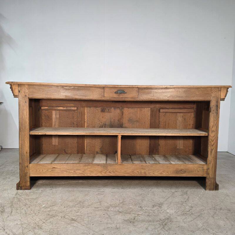 Important oak bar from a café around 1900.