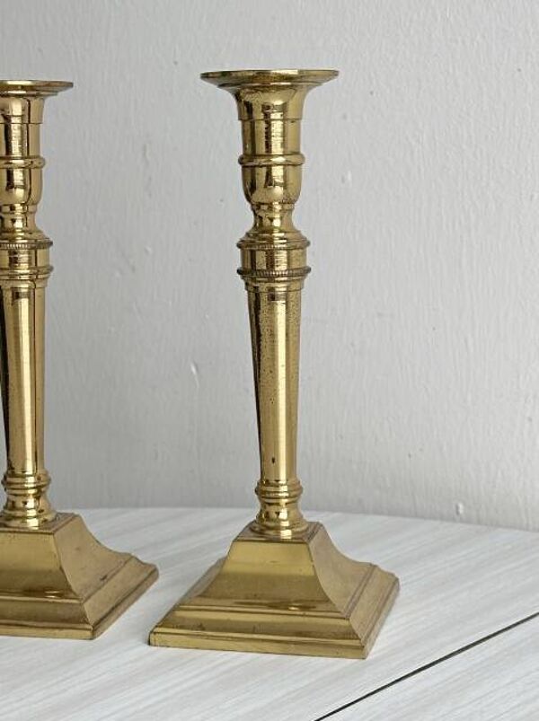 Bougeoirs anciens en métal doré