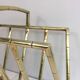 Brass faux-bamboo style magazine rack