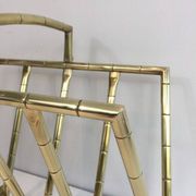 Brass faux-bamboo style magazine rack