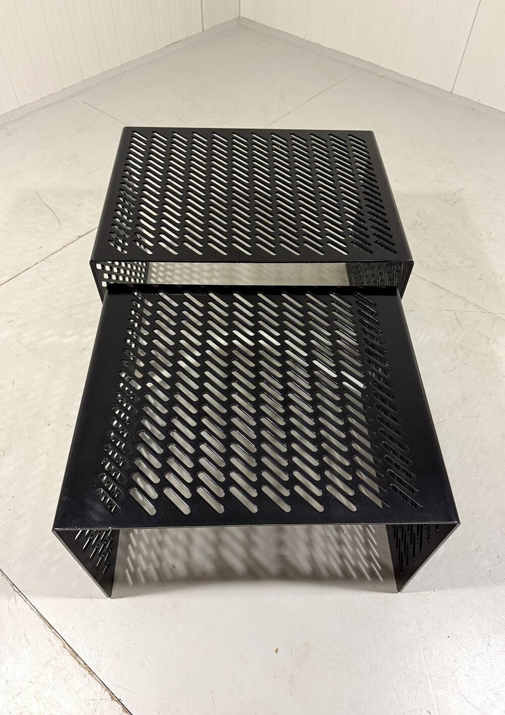 Black perforated steel nesting tables Italy 1980’s