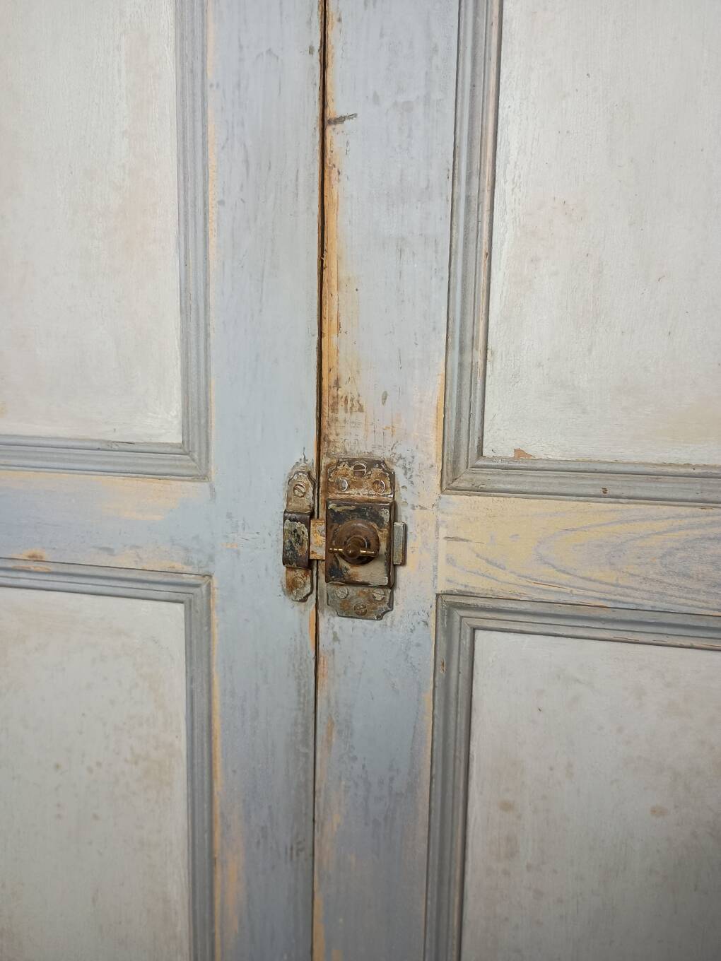 Low Parisian wardrobe with two doors, made of fir with original patina