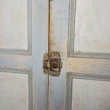 Low Parisian wardrobe with two doors, made of fir with original patina