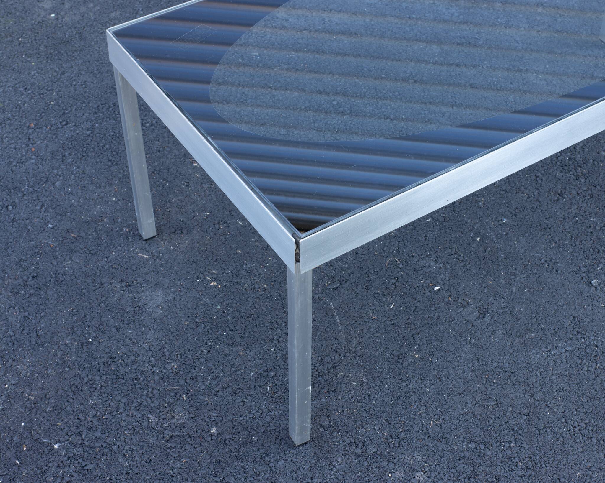 Glass coffee table with brushed aluminum legs, 1970