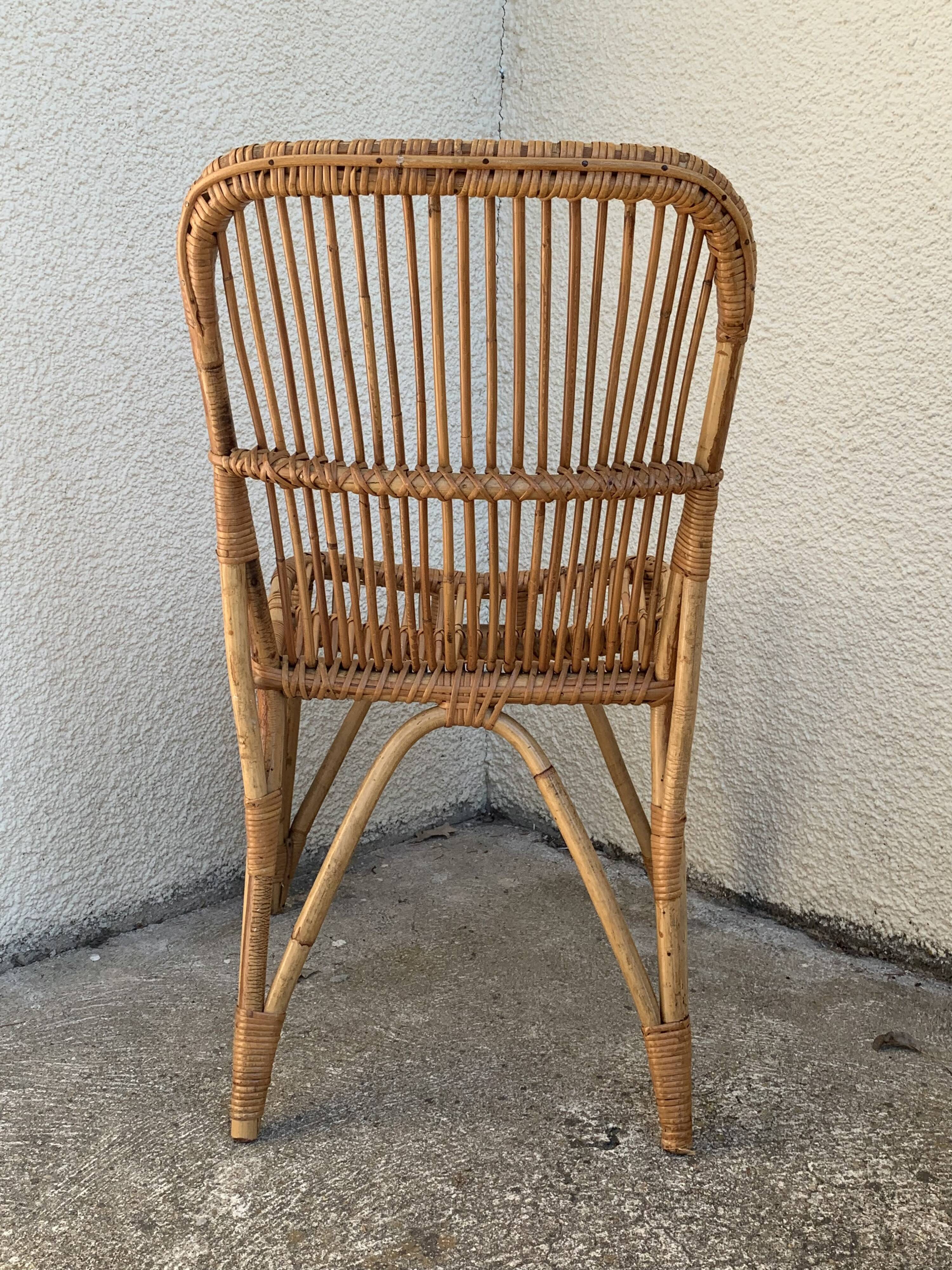 Chair and armchair in vintage rattan 1950