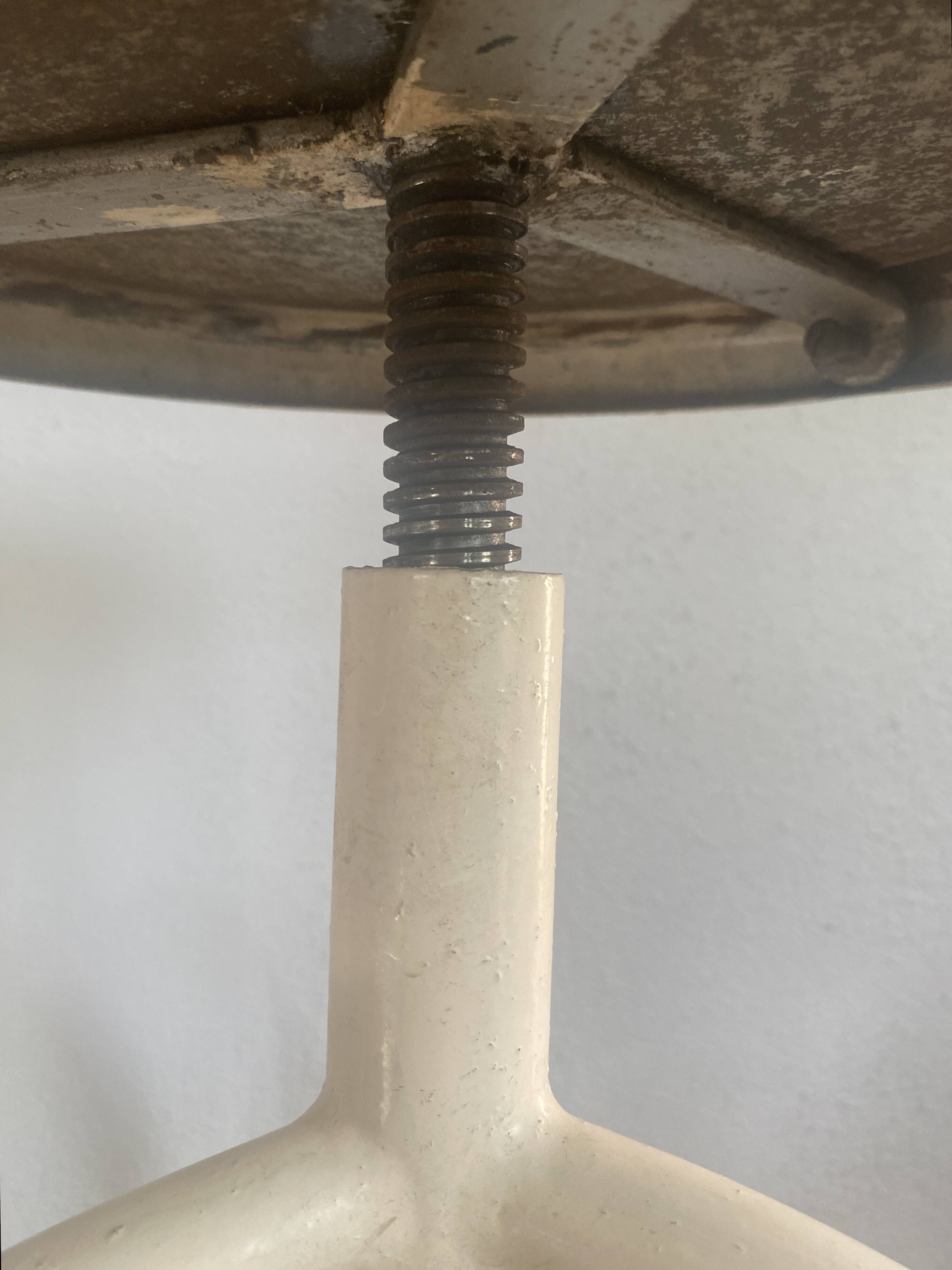 Adjustable metal pharmacy stool